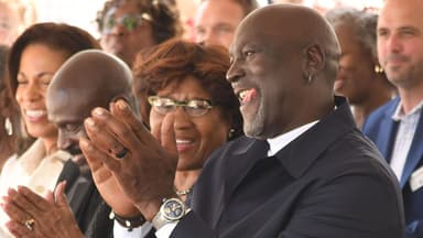 Michael Jordan listens to the speakers outside of The Michael Jordan Family Medical Clinic led by Novant Health before taking part in a ribbon cutting ceremony for the new clinic opening off of Greenfield Street on Tuesday May 7, 2024, in Wilmington, N.C.