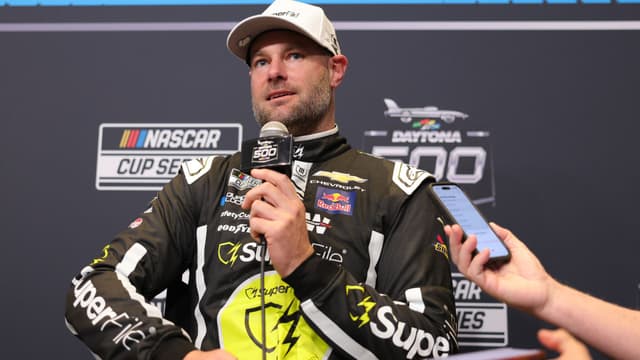 Feb 11, 2026; Daytona Beach, Florida, USA; NASCAR Cup Series driver Shane Van Gisbergen (97) speaks to the media during the Daytona 500 Media Day at Daytona International Speedway.