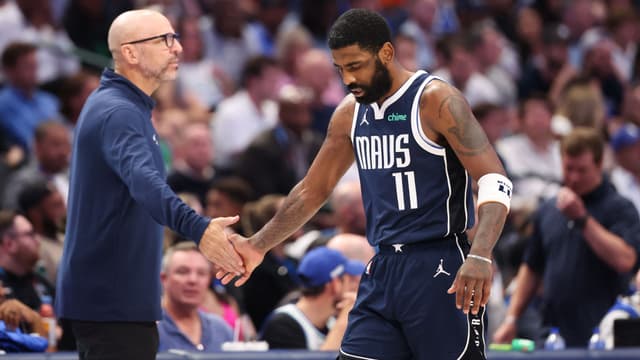 May 28, 2024; Dallas, Texas, USA; Dallas Mavericks head coach Jason Kidd high fives guard Kyrie Irving (11) during the third quarter against the Minnesota Timberwolves in game four of the western conference finals for the 2024 NBA playoffs at American Airlines Center.