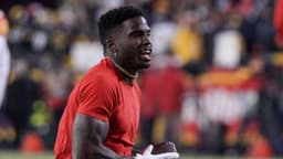 Kansas City Chiefs wide receiver Tyreek Hill (10) warms up against the Pittsburgh Steelers before an AFC Wild Card playoff football game at GEHA Field at Arrowhead Stadium.