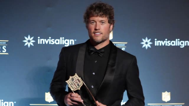 Los Angeles Rams quarterback Matthew Stafford posts with the NFL Honors most valuable player trophy at Palace of Fine Arts.