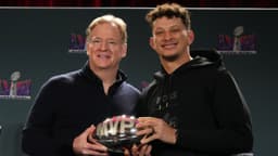 Roger Goodell handing Patrick Mahomes the NFL Super Bowl MVP award