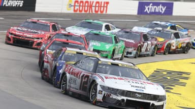 Oct 26, 2025; Martinsville, Virginia, USA; NASCAR Cup Series driver Ryan Blaney (12) leads during stage three of the Xfinity 500 at Martinsville Speedway