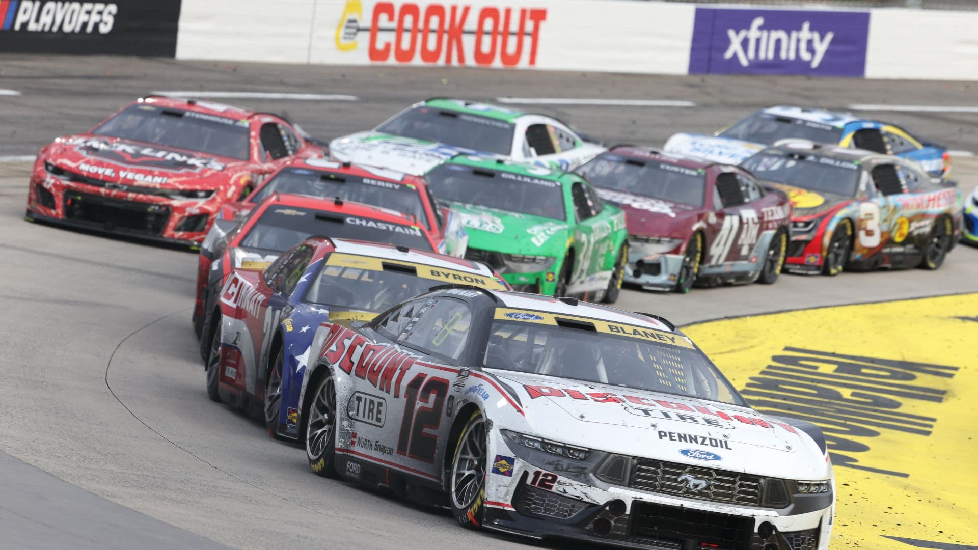 Oct 26, 2025; Martinsville, Virginia, USA; NASCAR Cup Series driver Ryan Blaney (12) leads during stage three of the Xfinity 500 at Martinsville Speedway