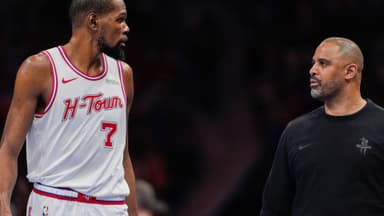 Feb 19, 2026; Charlotte, North Carolina, USA; Houston Rockets forward Kevin Durant (7) talks with head coach Ime Udoka during the second quarter against the Charlotte Hornets at Spectrum Center