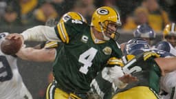 Green Bay Packers quarterback Brett Favre has to scramble but makes it outside to complete a shovel pass to Donald Lee during the second quarter of the Green Bay Packers and Seattle Seahawks NFL playoff game on Saturday, Jan. 12, 2008, at Lambeau Field.