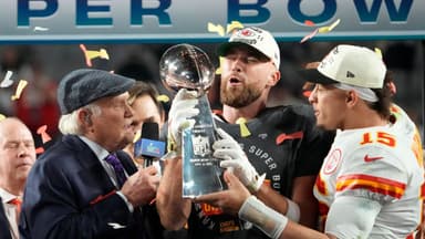 Super Bowl 57: Kansas City Chiefs quarterback Patrick Mahomes passes the the Lombardi Trophy to Travis Kelce after winning the Super Bowl against the Philadelphia Eagles at State Farm Stadium on Feb 12, 2023.