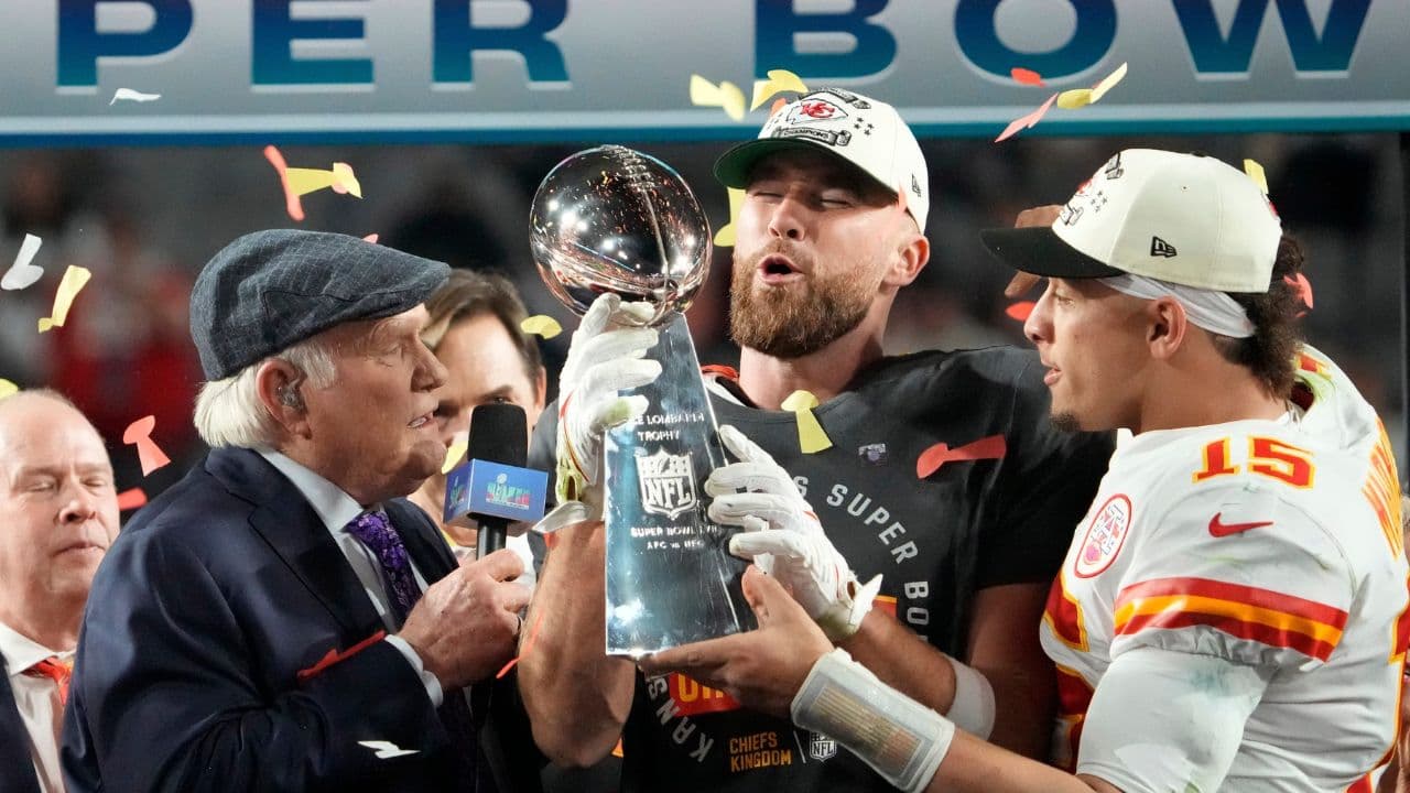 Super Bowl 57: Kansas City Chiefs quarterback Patrick Mahomes passes the the Lombardi Trophy to Travis Kelce after winning the Super Bowl against the Philadelphia Eagles at State Farm Stadium on Feb 12, 2023.