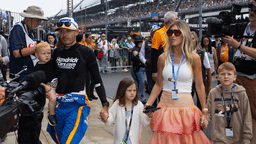 May 26, 2024; Indianapolis, Indiana, USA; Indycar Series driver Kyle Larson holds son Cooper Larson as he walks with daughter Audrey Larson, wife Katelyn Larson and son Owen Larson prior to the 108th running of the Indianapolis 500 at Indianapolis Motor Speedway. Mandatory Credit: Mark J. Rebilas-Imagn Images