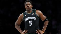 Feb 22, 2026; Minneapolis, Minnesota, USA; Minnesota Timberwolves guard Anthony Edwards (5) looks on during the first half against the Philadelphia 76ers at Target Center.