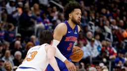 Jan 5, 2026; Detroit, Michigan, USA; Detroit Pistons guard Cade Cunningham (2) dribbles defended by New York Knicks guard Tyler Kolek (13) in the second half at Little Caesars Arena. Mandatory Credit: Rick Osentoski-Imagn Images