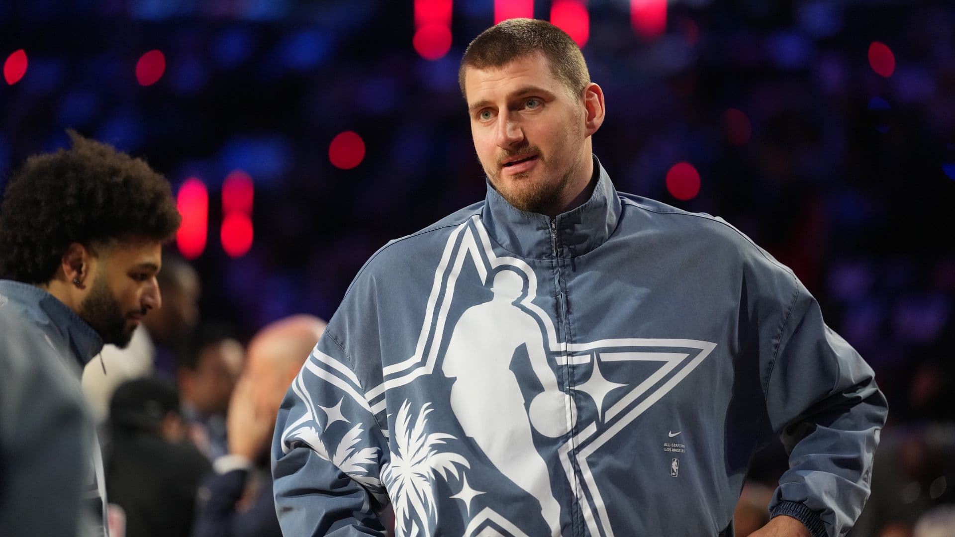 Feb 15, 2026; Inglewood, California, USA; Team World center Nikola Jokic (15) of the Denver Nuggets looks on before game 1 during the 75th NBA All Star Game at Intuit Dome.