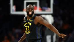 Feb 5, 2026; Phoenix, Arizona, USA; Golden State Warriors forward Draymond Green (23) reacts against the Phoenix Suns in the first half at Mortgage Matchup Center