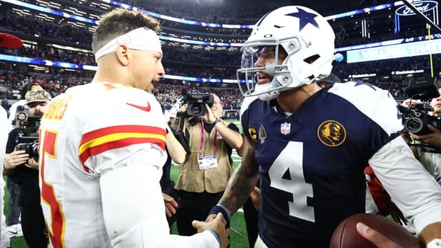 Kansas City Chiefs quarterback Patrick Mahomes (15) and Dallas Cowboys quarterback Dak Prescott (4) greet each other after the game at AT&T Stadium.