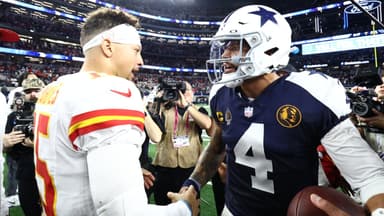 Kansas City Chiefs quarterback Patrick Mahomes (15) and Dallas Cowboys quarterback Dak Prescott (4) greet each other after the game at AT&T Stadium.