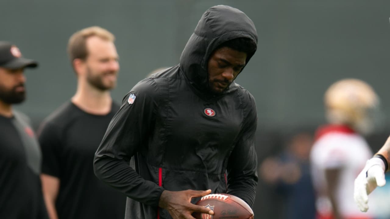 Still recovering from knee surgery, San Francisco 49ers wide receiver Brandon Aiyuk (left) hangs out with teammate George Kittle (85) during the second day of training camp.