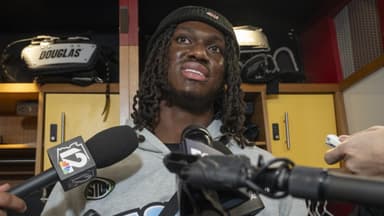 Marvin Harrison Jr. talks with the media in the locker room at Dignity Health Arizona Cardinals Training Center in Tempe on Jan. 5, 2026.