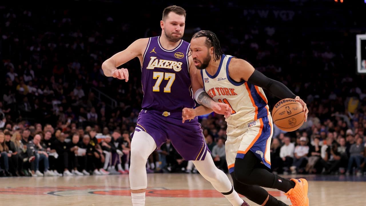 Feb 1, 2026; New York, New York, USA; New York Knicks guard Jalen Brunson (11) drives to the basket against Los Angeles Lakers guard Luka Doncic (77) during the second quarter at Madison Square Garden. Mandatory Credit: Brad Penner-Imagn Images