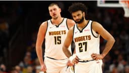 Denver Nuggets guard Jamal Murray (27) and center Nikola Jokic (15) against the Phoenix Suns at the Mortgage Matchup Center
