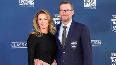 Jan 19, 2024; Charlotte, NC, USA; Dale Earnhardt Jr. and his wife Amy during the red carpet at Charlotte Convention Center Crown Ballroom.