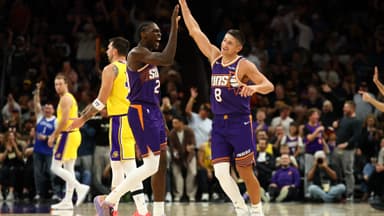 Feb 26, 2026; Phoenix, Arizona, USA; Phoenix Suns guard Grayson Allen (8) celebrates with forward Rasheer Fleming (20) against the Los Angeles Lakers in the second half at Mortgage Matchup Center.
