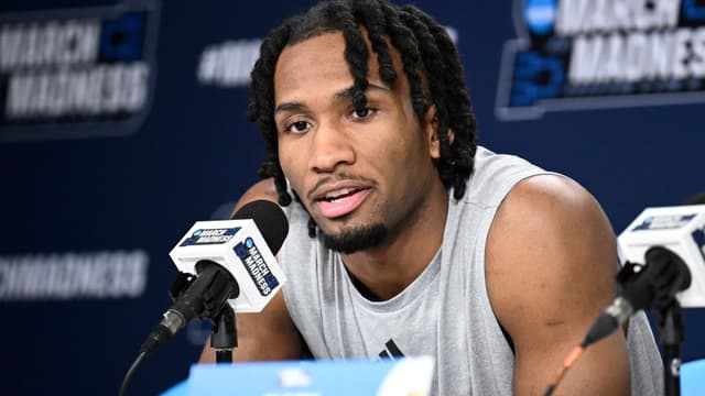 Mar 19, 2026; San Diego, CA, USA; Kansas Jayhawks guard Darryn Peterson (22) speaks at a news conference ahead of the first round of the men's 2026 NCAA Tournament at Viejas Arena