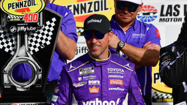 Mar 15, 2026; Las Vegas, Nevada, USA; Joe Gibbs Racing driver Denny Hamlin (11) celebrates his victory following the Pennzoil 400 at Las Vegas Motor Speedway. Mandatory Credit: Gary A. Vasquez-Imagn Images