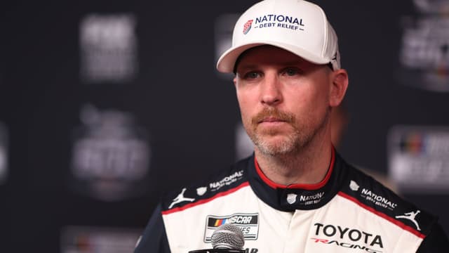 DAYTONA BEACH, FL - FEBRUARY 11: Denny Hamlin ( 11 Joe Gibbs Racing National Debt Relief Toyota) is being interviewed during Media Day for the NASCAR, Motorsport, USA Cup Series Daytona 500 on February 11, 2026 at Daytona International Speedway in Daytona Beach, FL