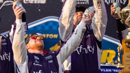 Mar 22, 2026; Darlington, South Carolina, USA; 23XI Racing Tyler Reddick (45) celebrates in Victory Lane after winning at Darlington Raceway.