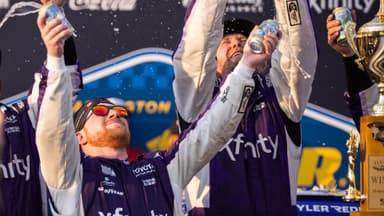 Mar 22, 2026; Darlington, South Carolina, USA; 23XI Racing Tyler Reddick (45) celebrates in Victory Lane after winning at Darlington Raceway.