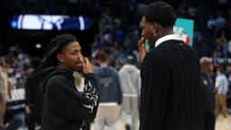 Memphis Grizzlies guard Ja Morant (left) and Utah Jazz forward Jaren Jackson Jr. (right) talk after a game at FedExForum