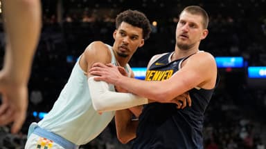 ; San Antonio Spurs center Victor Wembanyama (1) and Denver Nuggets center Nikola Jokic (15) battle for position during an inbound pass in the second half at Frost Bank Center