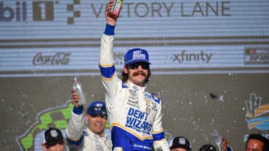 Mar 8, 2026; Avondale, Arizona, USA; Team Penske driver Ryan Blaney (12) celebrates his victory of the Straight Talk Wireless 500 at Phoenix Raceway
