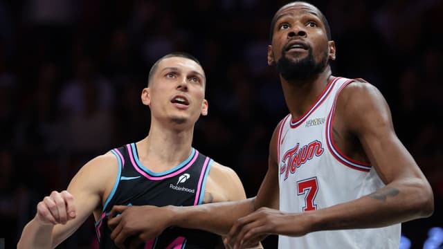 Houston Rockets forward Kevin Durant (7) defends against Miami Heat guard Tyler Herro (14) during the fourth quarter at Kaseya Center.