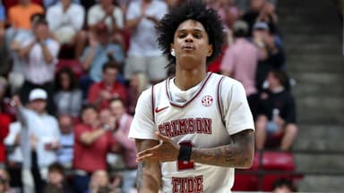 Alabama Crimson Tide guard Aden Holloway (2) reacts after his three pointer during the second half against the Auburn Tigers at Coleman Coliseum.