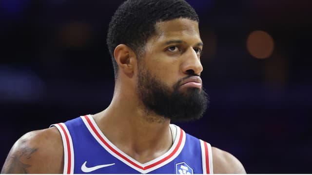 Jan 27, 2026; Philadelphia, Pennsylvania, USA; Philadelphia 76ers forward Paul George (8) looks on after a score against the Milwaukee Bucks during the fourth quarter at Xfinity Mobile Arena