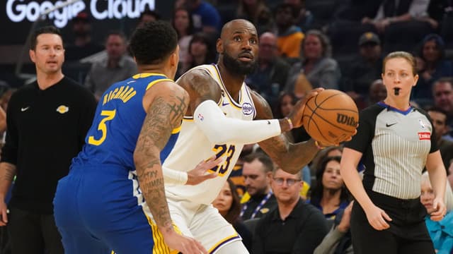 Feb 28, 2026; San Francisco, California, USA; Los Angeles Lakers forward LeBron James (23) is defended by Golden State Warriors guard Will Richard (3) in the first period at Chase Center