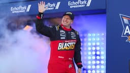 Feb 22, 2026; Hampton, Georgia, USA; NASCAR Cup Series driver Michael McDowell waves during introductions at EchoPark Speedway.