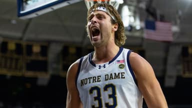 Notre Dame Fighting Irish forward Carson Towt (33) celebrates against the Boston College Eagles during the second half at Purcell Pavilion at the Joyce Center.