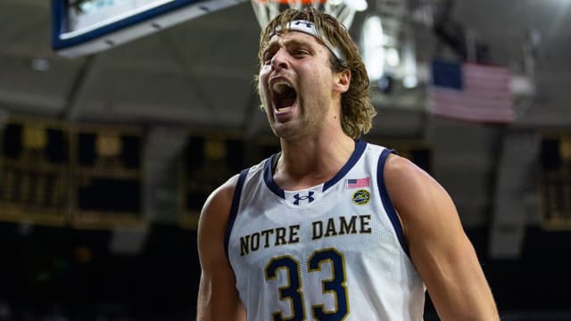 Notre Dame Fighting Irish forward Carson Towt (33) celebrates against the Boston College Eagles during the second half at Purcell Pavilion at the Joyce Center.