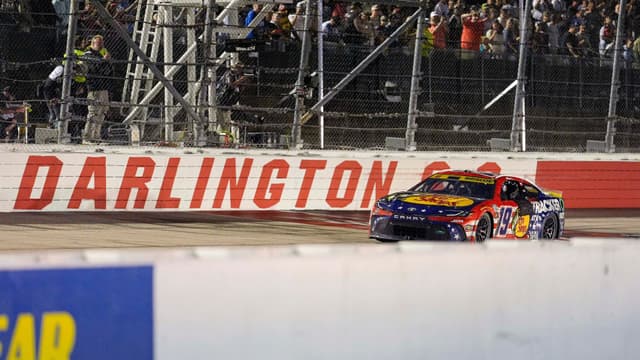 Aug 31, 2025; Darlington, South Carolina, USA; NASCAR Cup Series driver Chase Briscoe (19) wins at the Cookouts Southern 500 at Darlington Raceway.