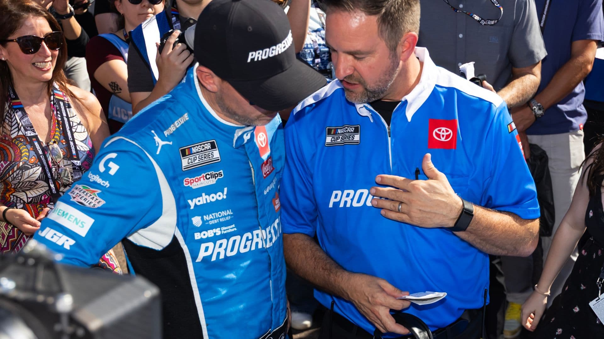 Nov 2, 2025; Avondale, Arizona, USA; NASCAR Cup Series driver Denny Hamlin (11) with crew chief Chris Gayle during the NASCAR Championship race at Phoenix Raceway