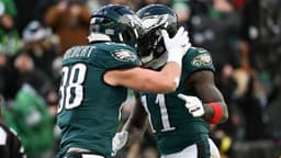 Philadelphia Eagles tight end Dallas Goedert (88) celebrates with wide receiver A.J. Brown (11) after scoring a touchdown against the Las Vegas Raiders during the first quarter at Lincoln Financial Field.