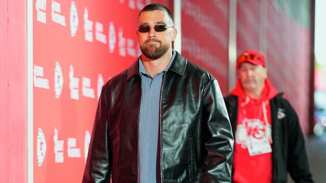Kansas City Chiefs tight end Travis Kelce (87) arrives prior to the game against the Las Vegas Raiders at GEHA Field at Arrowhead Stadium.