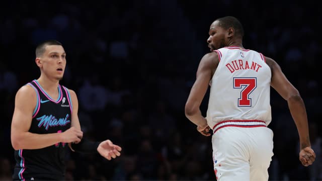 Feb 28, 2026; Miami, Florida, USA; Houston Rockets forward Kevin Durant (7) stares at Miami Heat guard Tyler Herro (14) during the second quarter at Kaseya Center.