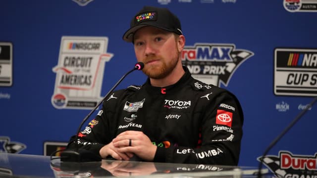 Mar 1, 2026; Austin, Texas, USA; NASCAR Cup Series driver Tyler Reddick (45) addresses the media after winning the NASCAR Cup Series Duramax Texas Grand Prix Powered by RelaDyne at Circuit of the Americas