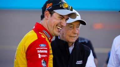 Nov 6, 2022; Avondale, Arizona, USA; NASCAR Cup Series driver Joey Logano celebrates with team owner Roger Penske after winning the Cup Championship at Phoenix Raceway