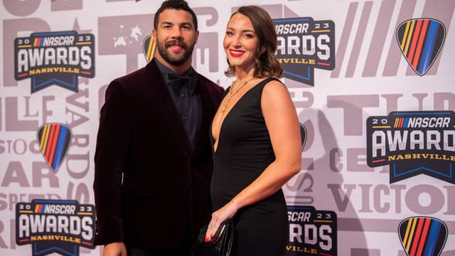 Bubba Wallace and his wife Amanda Wallace poses on the red carpet for the 2023 NASCAR Awards Banquet at the Music City Center in Nashville, Tenn., Thursday, Nov. 30, 2023.