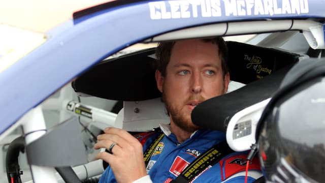 DAYTONA BEACH, FL - FEBRUARY 14: Garrett Mitchell ( 30 Kenetix Ford) aka YouTuber Cleetus McFarland sits in his car waiting for practice for the ARCA Menards Series Chilli s Ride the Dente 200 on February 14, 2025, at Daytona International Speedway in Daytona Beach, FL