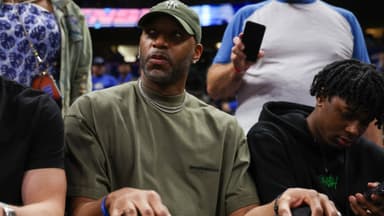 Apr 27, 2024; Orlando, Florida, USA; Orlando Magic former guard Tracy McGrady looks on from the sidelines during a game against the Cleveland Cavaliers in the fourth quarter during game four of the first round for the 2024 NBA playoffs at Kia Center.